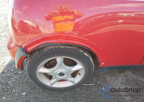 2005 Mini Cooper z USA, uszkodzony, nr VIN WMWRC33445TJ65390